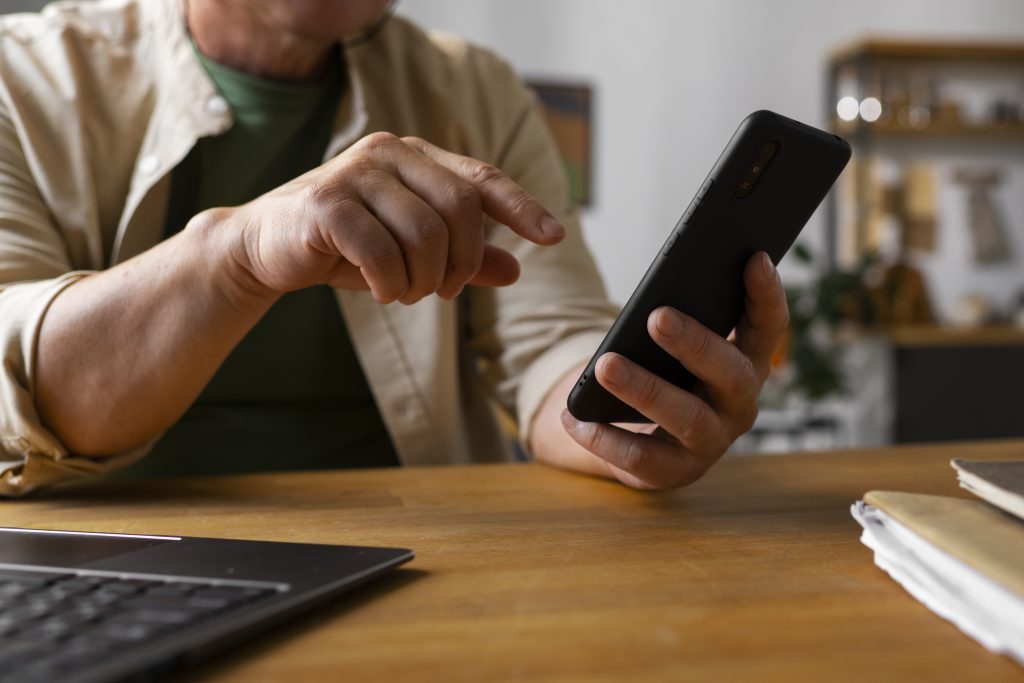 Person using a cell phone.